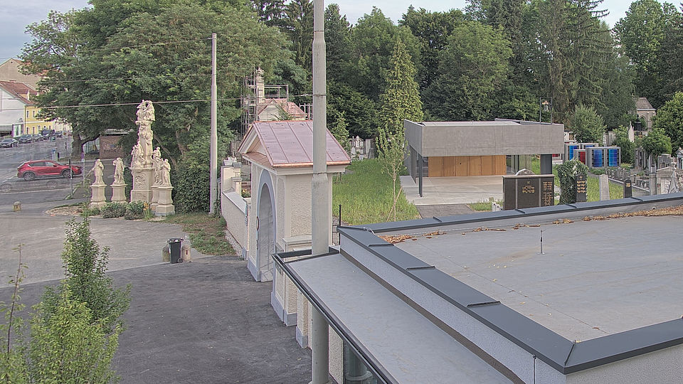 Livebild Baukamera 1 - Webcam 'Gesamtansicht Südseite' - Baustelle Neubau Einsegnungshalle St. Peter Stadtfriedhof, Graz (ca. 5 Minuteninterval)